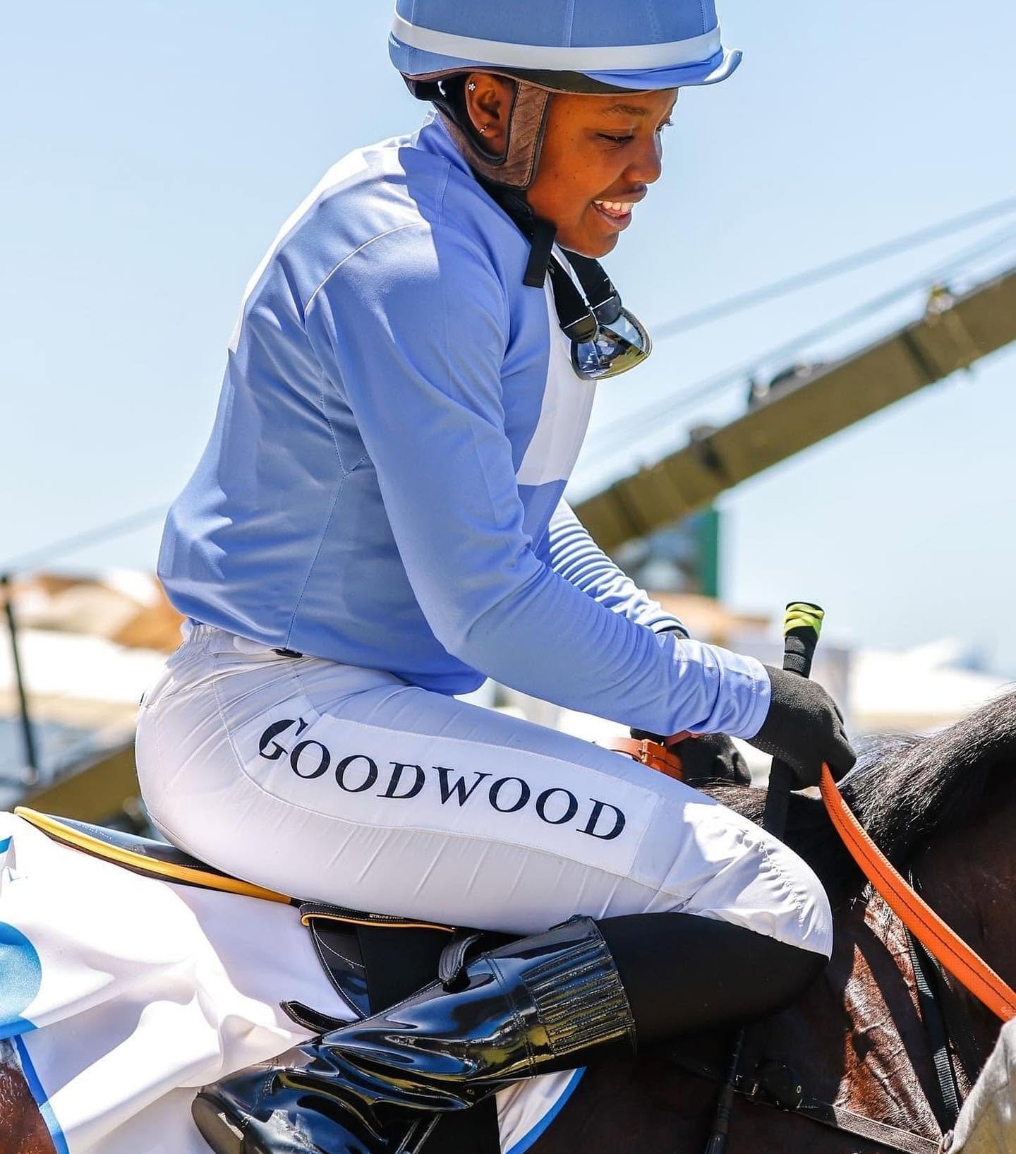 O'Meara Rusike in a horse racing setting